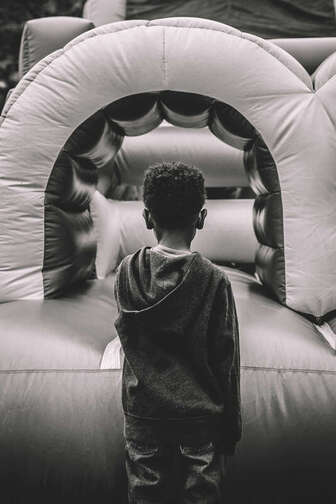 (Black and white) Chile in front of moon bounce